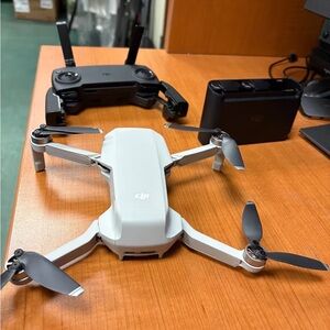 DJI Gray and Black Drone with Controller